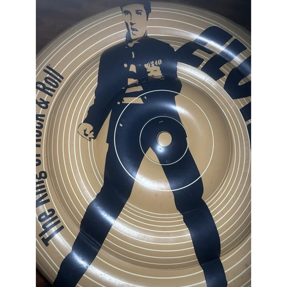 The King Of Rock And Roll Pool Float. Shaped like a vintage 45 RPM vinyl record.